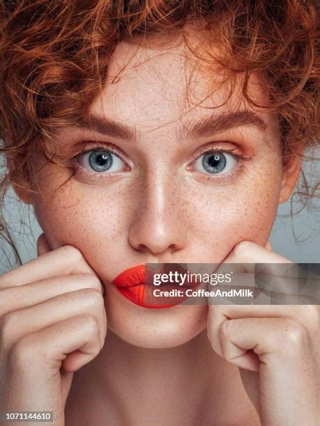 750 Curvy Redhead Stock Photos & High